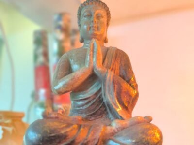 Buda candelabro